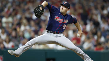 MINNEAPOLIS, MN - AUGUST 30: Minnesota Twins relief pitcher Jhoan Duran  (59) looks on after walking a batter in the ninth inning of a MLB game  between the Minnesota Twins and Cleveland