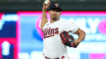 Minnesota Twins pitcher Jhoan Duran (59) delivers a pitch in the eighth  inning during a spring training baseball game against the Tampa Bay Rays at  the Charlotte Sports Park Tuesday March 29