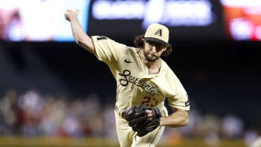 PHOENIX, AZ - JULY 09: Arizona Diamondbacks starting pitcher Zac Gallen  (23) waves after being announced as an 2023 All Star during a baseball game  between the Pittsburgh Pirates and the Arizona