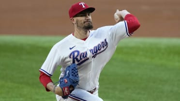 Andrew Heaney ties AL strikeout mark as Rangers rout Royals