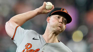 Baltimore Orioles relief pitcher Shintaro Fujinami, left, reacts