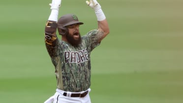 San Diego Padres' Rougned Odor pauses at first base after being picked off  against the Milwaukee Brewers during the second inning of a spring training  baseball game Thursday, March 23, 2023, in