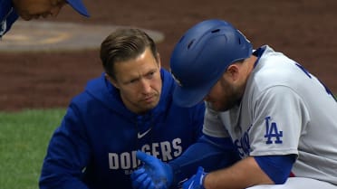 Max Muncy  leaves the game after getting HBP