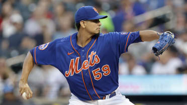 Carlos Carrasco of the New York Mets throws a pitch during the