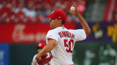 Cardinal starting pitcher John Smoltz (30) pitching in the third