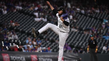 Atlanta, GA. USA; Colorado Rockies relief pitcher Justin Lawrence (61)  delivers a pitch during a major league baseball game against the Atlanta  Brave Stock Photo - Alamy