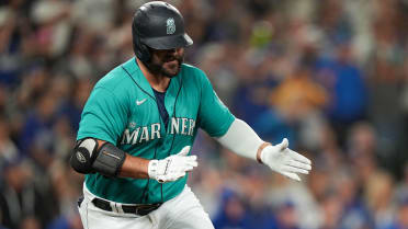 Los Angeles Angels' Logan O'Hoppe is given a kabuto after hitting a solo  home run off Seattle Mariners starting pitcher Logan Gilbert during the  fourth inning of a baseball game Monday, Sept.