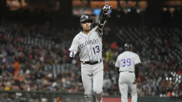 Colorado Rockies second baseman Alan Trejo (13) is doused with ice after  hitting a solo, walk-off home run against New York Yankees relief pitcher Ron  Marinaccio (97) in the 11th inning of