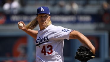 Mets starting pitcher Noah Syndergaard(Thor) throws the first pitch - Gold  Medal Impressions