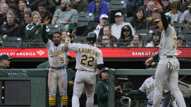 A's edge Giants before biggest home crowd of the season