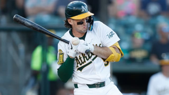 Jacob Wilson exits game after hit-by-pitch on left wrist