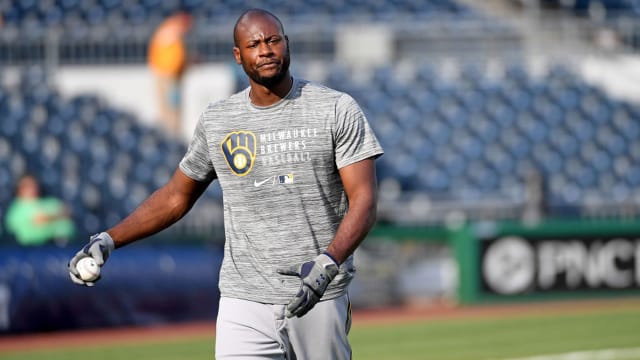 Watch: Brewers' Cain taunts kids after crushing HR out of backyard