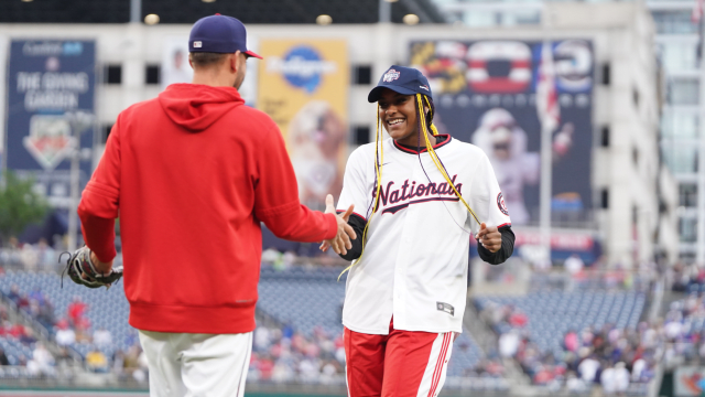 Matt Barnes catches Aaliyah Edwards' ceremonial pitch with Nationals