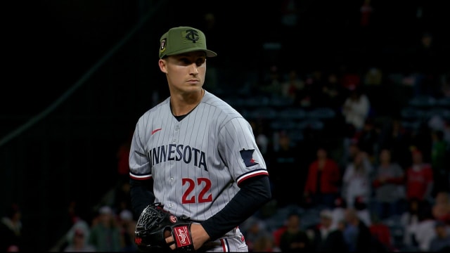 From left, a U.S. Airman teaches Major League Baseball players