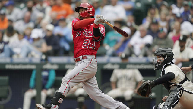 Los Angeles Angels pitcher Shohei Ohtani (17) walks to the dugout with  catcher Kurt Suzuki after ending the top of the fourth inning against the  Cleveland Indians at Angel Stadium in Anaheim