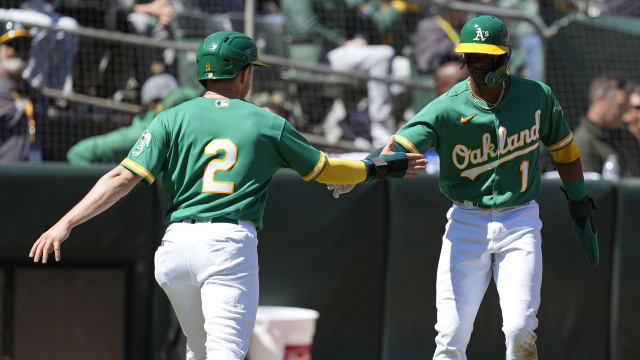 A's face pick between young infielders with Aledmys Díaz due back from