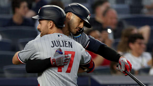 Julien gets first MLB hit, HR -- both in 9-run first