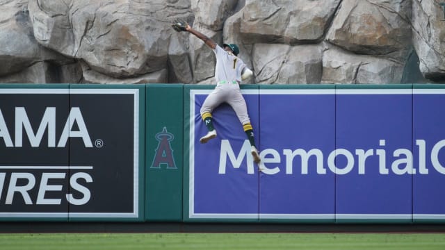 Denzel Clarke's incredible home run robbery against Angels