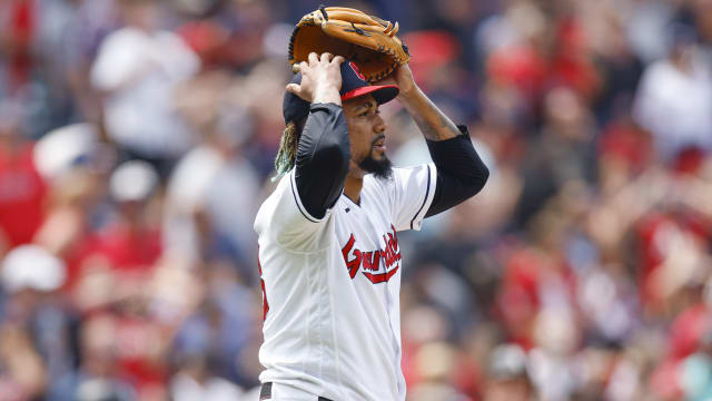 A young fan saves Austin Riley from an out, robs Kole Calhoun of a catch. :  r/baseball