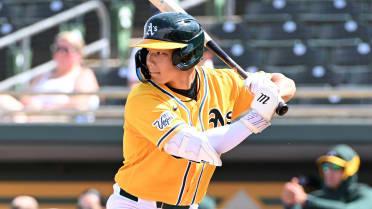 A's variation on Shotime pitches, hits and plays the infield!