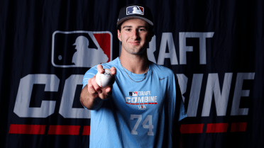 MLB's No. 15 Draft prospect is 6-foot-6, pumps 99 mph and looks up to a HOF closer
