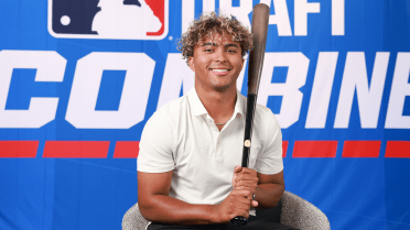 'Outwork everybody': How MLB's No. 14 Draft prospect hit his way to the national stage