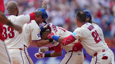 Phillies tie it in 9th, walk it off in 10th on Crawford's 1st RBI