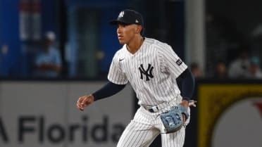 Yanks reassign top prospect Lombard to Minors camp