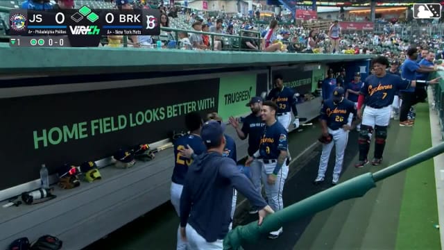 Jesus Baez hugs teammates after trade to Cardinals
