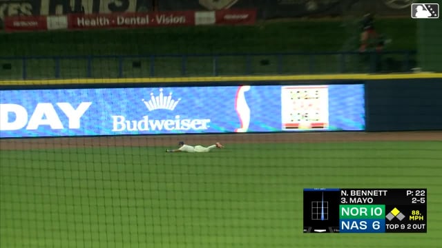 Isaac Collins lays out for a diving catch
