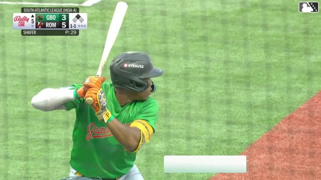 Yordany De Los Santos singles on a line drive to center fielder Dixon Williams. Edward Florentino scores.