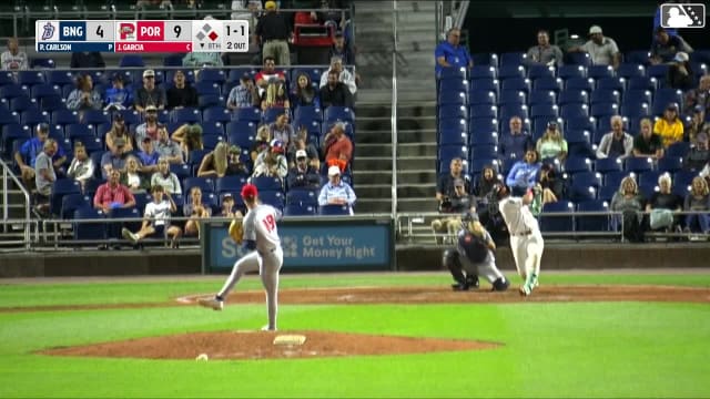 Johanfran Garcia doubles (13) on a line drive to left fielder Corey Collins. Ronald Rosario scores.