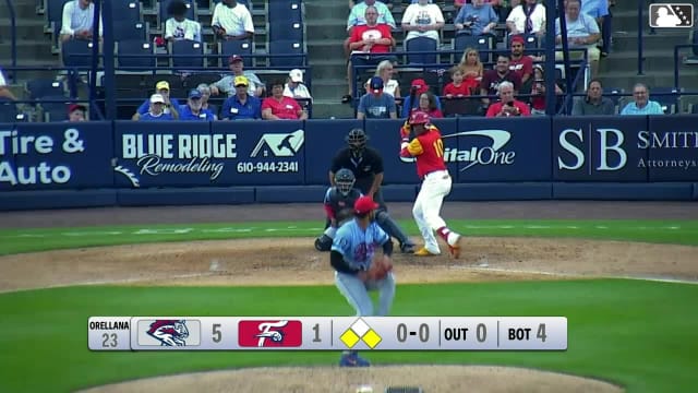 Aroon Escobar singles on a line drive to center fielder John Bay. Raylin Heredia scores.