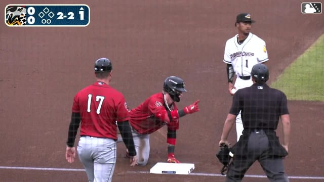 Max Clark hustles for a triple