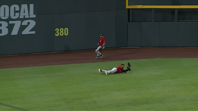 Jordan Lawlar makes a diving catch while on a rehab