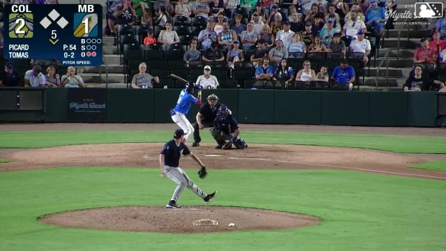 Juan Tomas homers (1) on a line drive to right field.