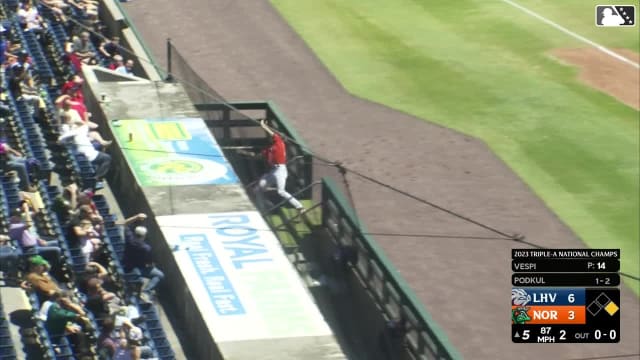 Coby Mayo falls into dugout attempting to make catch