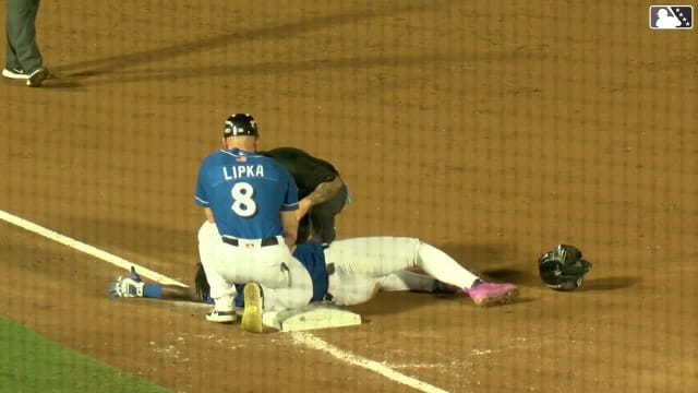 Luis Peña exits the game after sustaining leg injury
