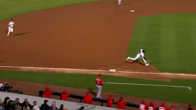 George Lombard Jr. makes a nice barehanded play