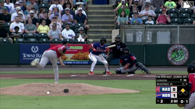 Enrique Bradfield Jr. drops down a bunt single