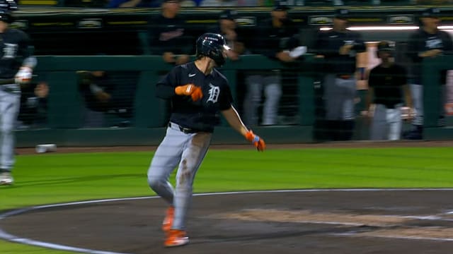 Izaac Pacheco scores on a throwing error