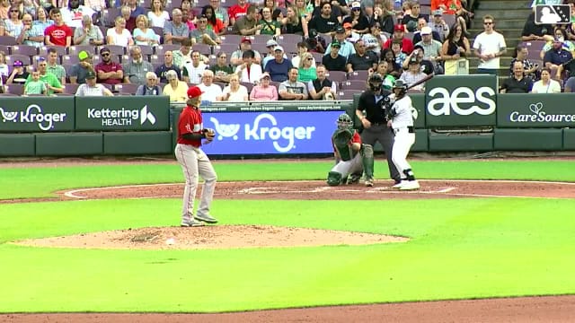 Leo Balcazar sends a drink flying with a homer