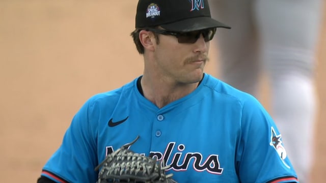 Aiden May wearing sunglasses on the mound