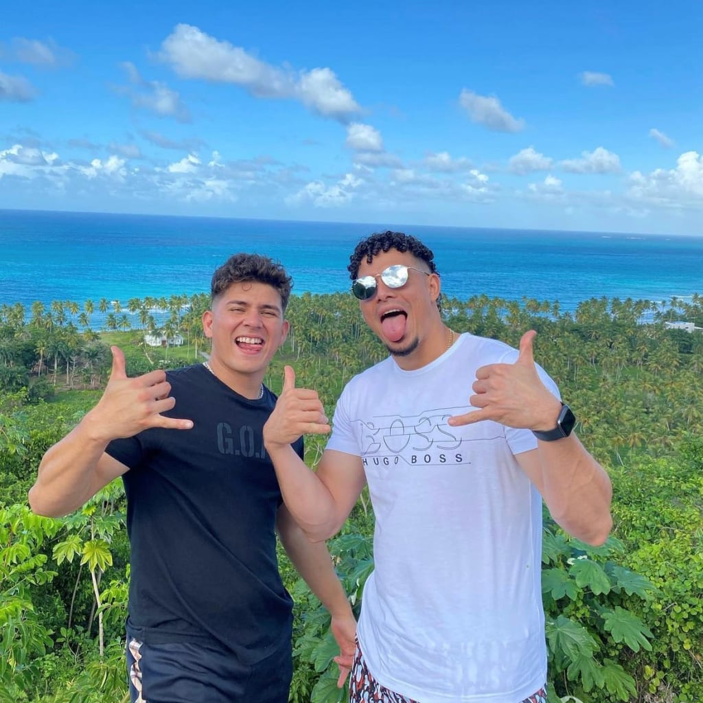 Urías and Adames overlooking Playa Coson in the Dominican Republic. Photo Credit: @luisurias97