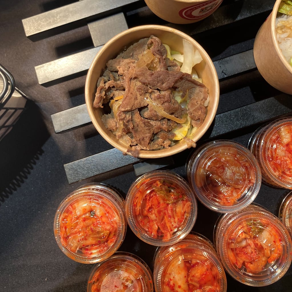 Bulgogi rice bowls with a side of kimchi