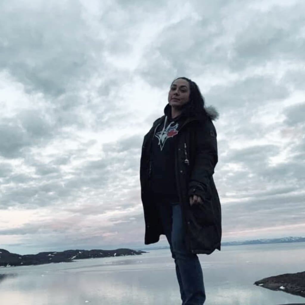 Storehouse Bar GM Valerie Hill sporting her Blue Jays hoodie out on the Iqaluit tundra