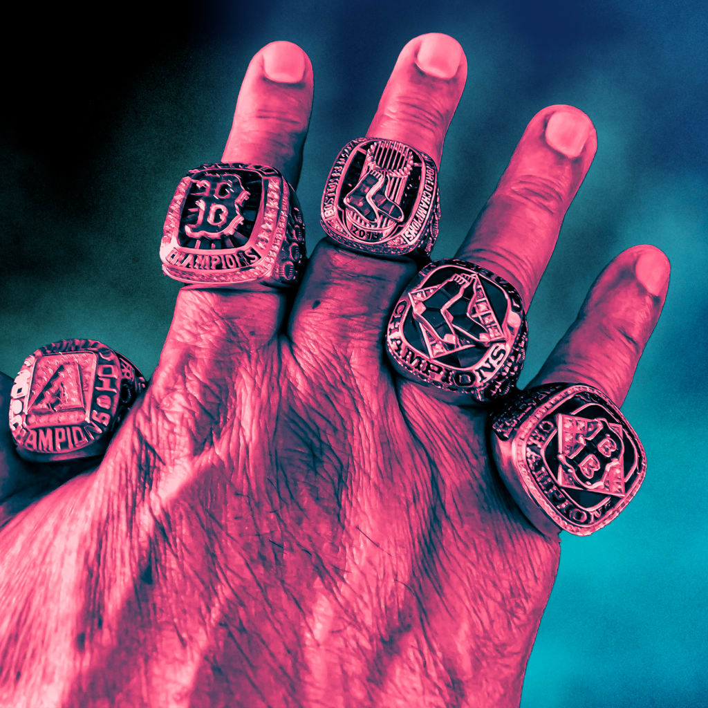 Russell Nua wearing all five of his rings