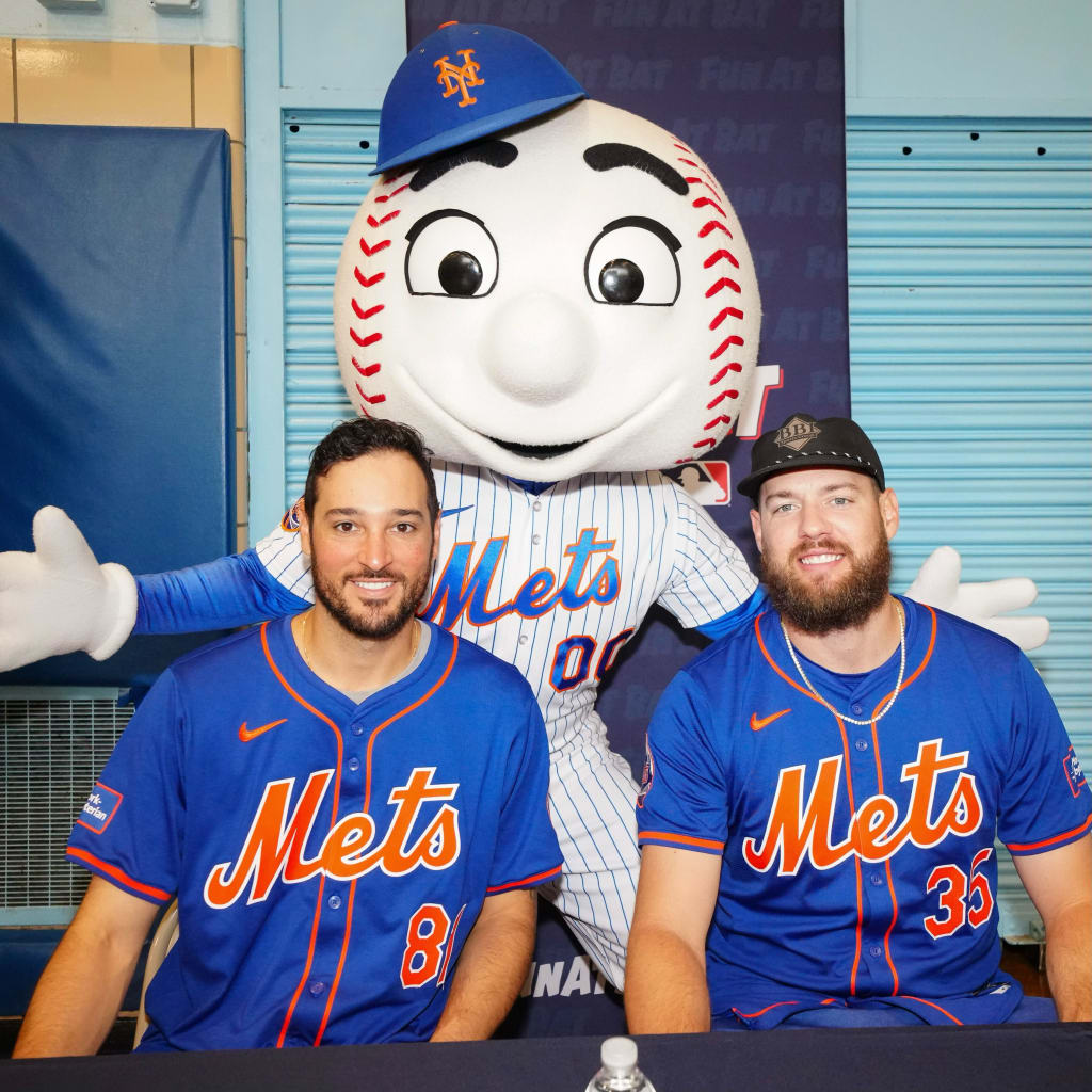 Mets pitchers Danny Young (left) and Adrian Houser and Mr. Met were in attendance. (Mary DeCicco/MLB Photos via Getty Images)
