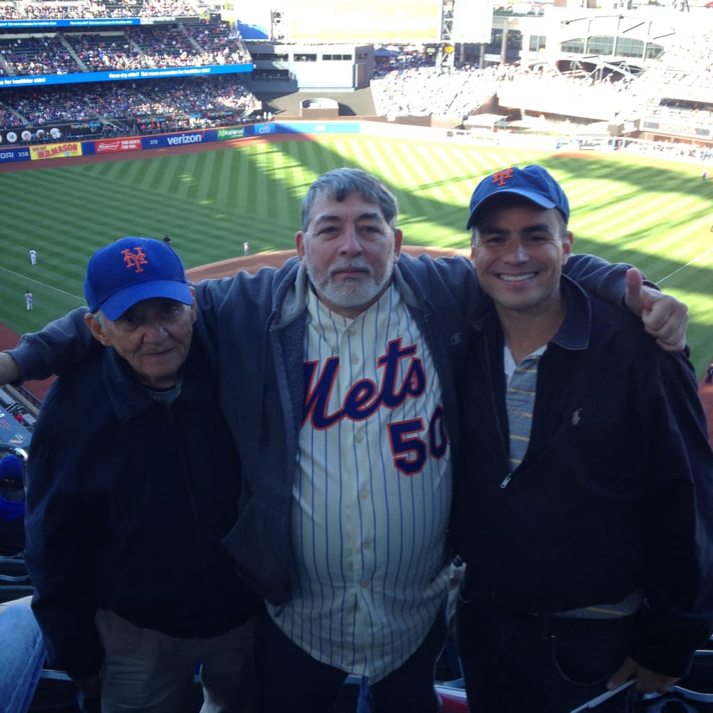 Casiano, middle, with his dad, Miguel, and brother, Charles, in 2015