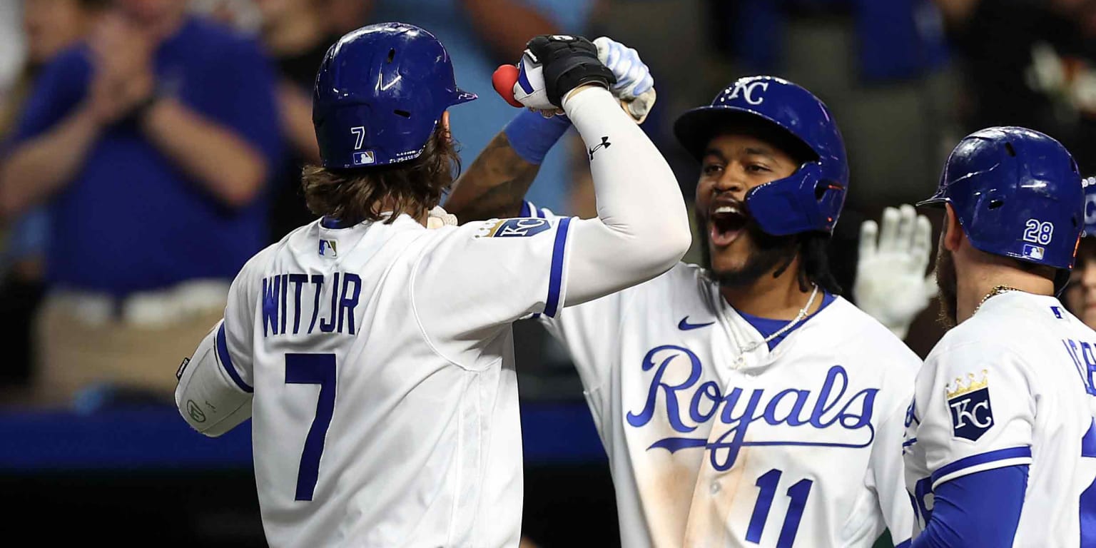 Kansas City Royals' Maikel Garcia (11) and Bobby Witt Jr